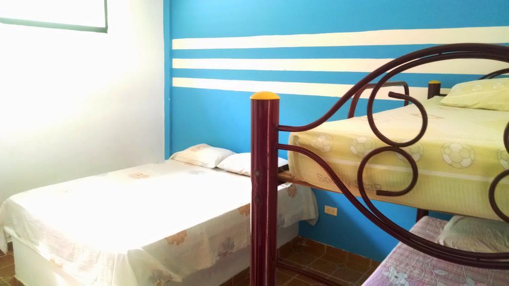 Hostal Dumbira Таганга Номер фото